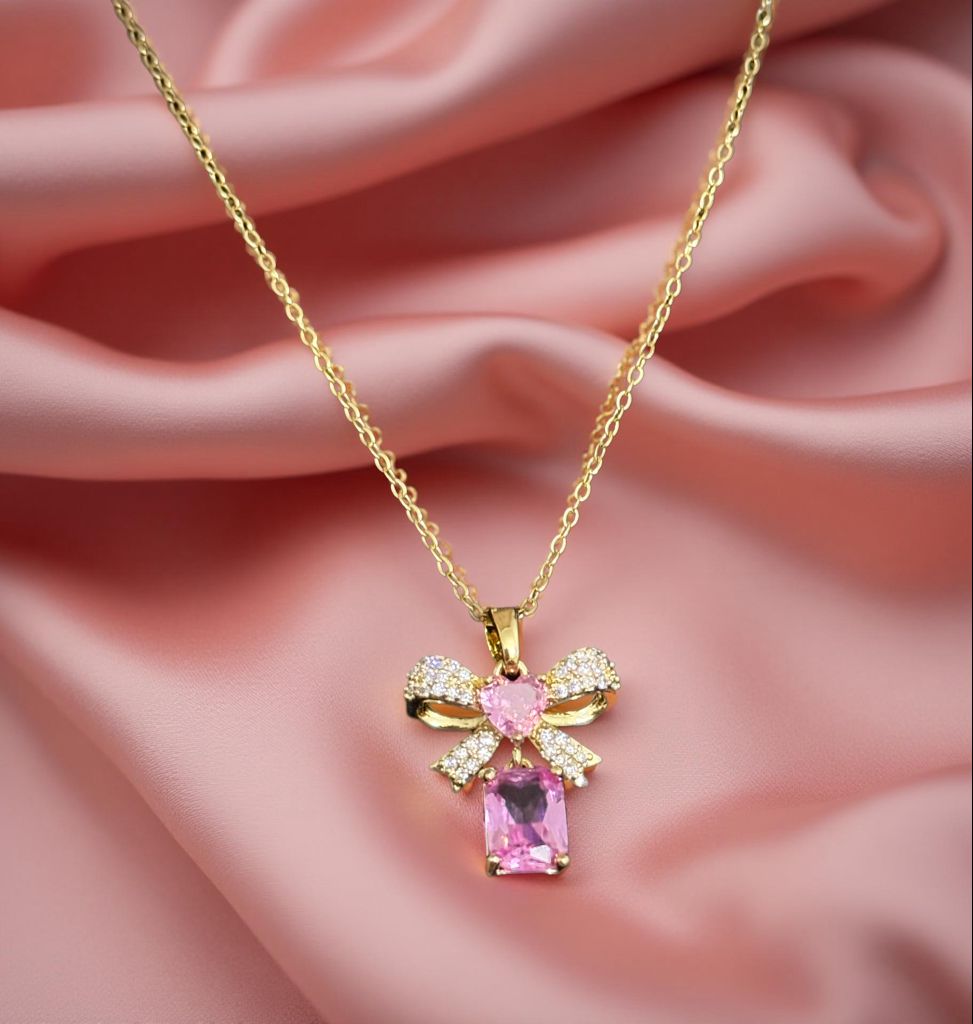 Stainless steel necklace “Pink Bow” – Glittering bow with heart and gemstone pendant